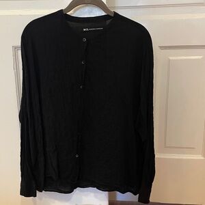 Beautiful NICO. Nicholson and Nicholson black blouse with peplum at back hem
